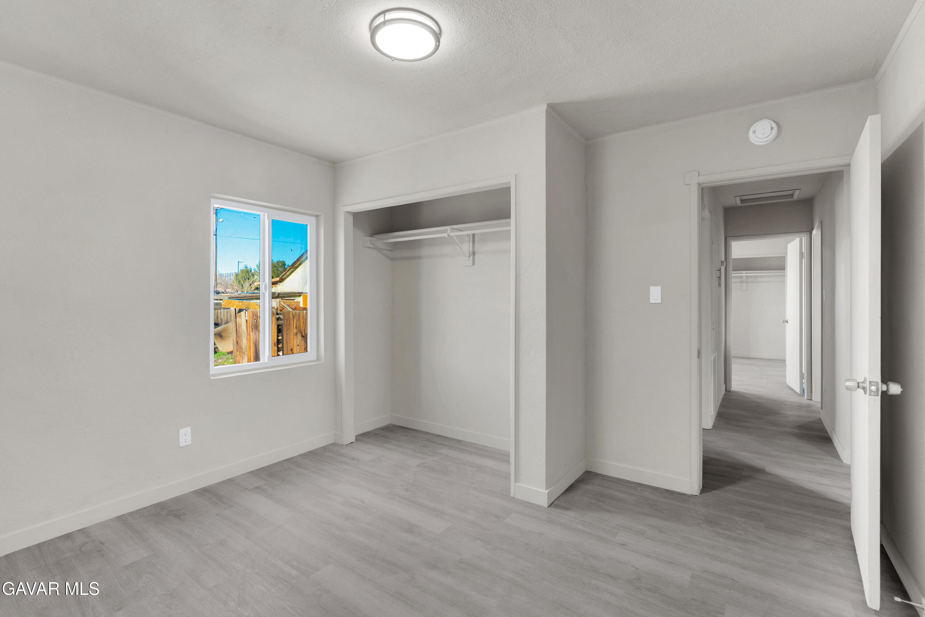 2494 Nadean Mojave, CA 93501 - Photo 11 of 19 an empty room with windows and closet