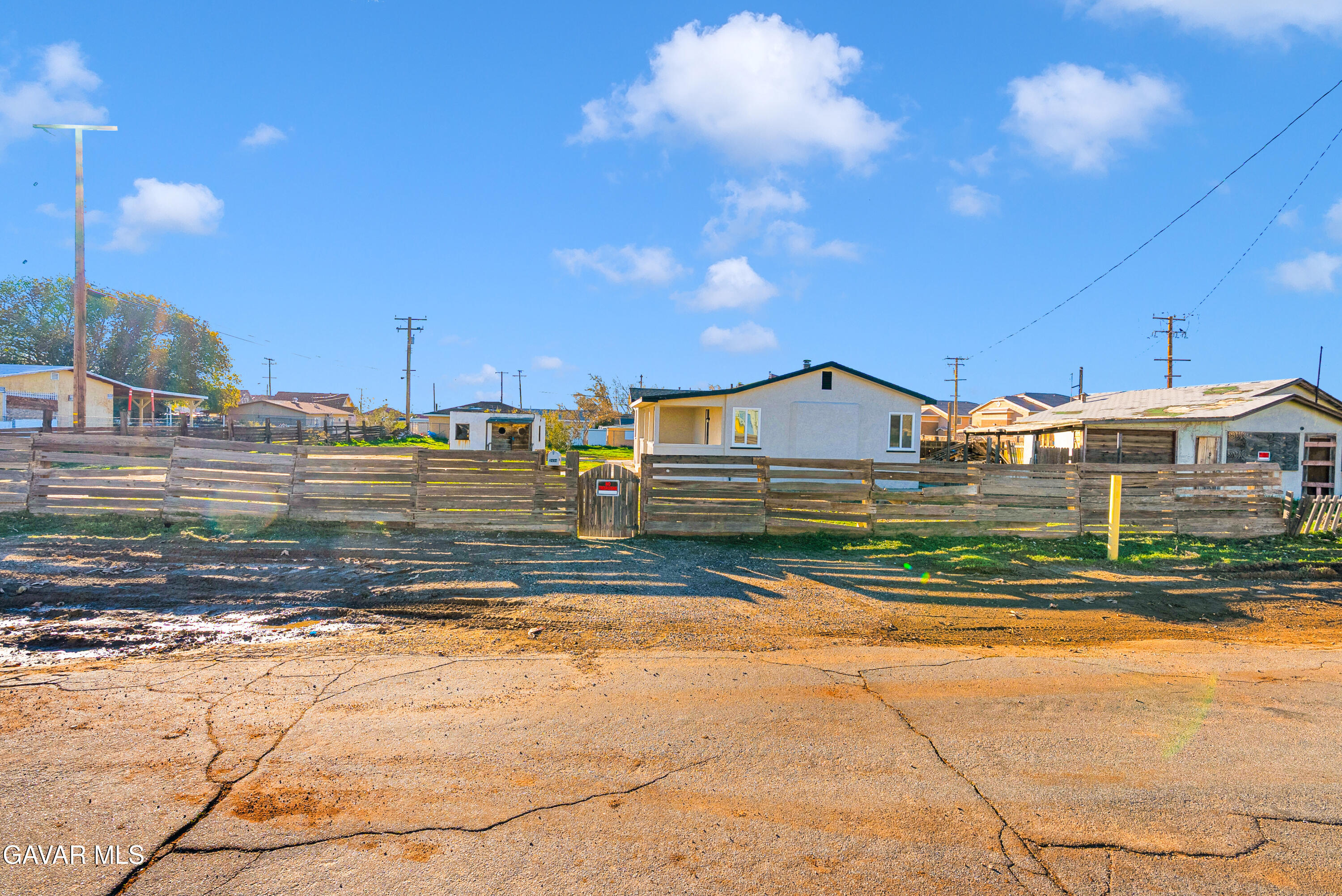 2494 Nadean Mojave, CA 93501 - Photo 19 of 19 a view of a house next to a big yard