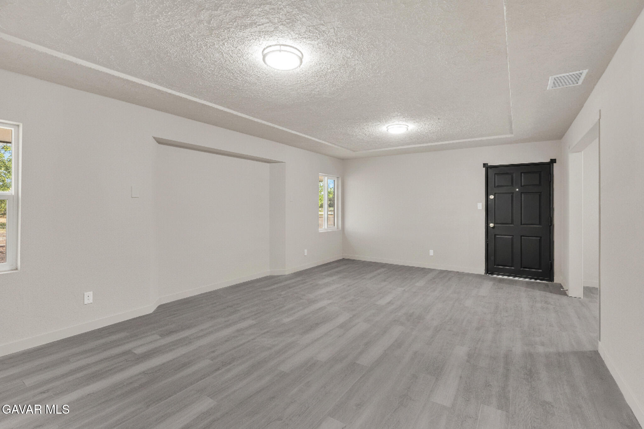 2494 Nadean Mojave, CA 93501 - Photo 7 of 19 wooden floor in an empty room with a window