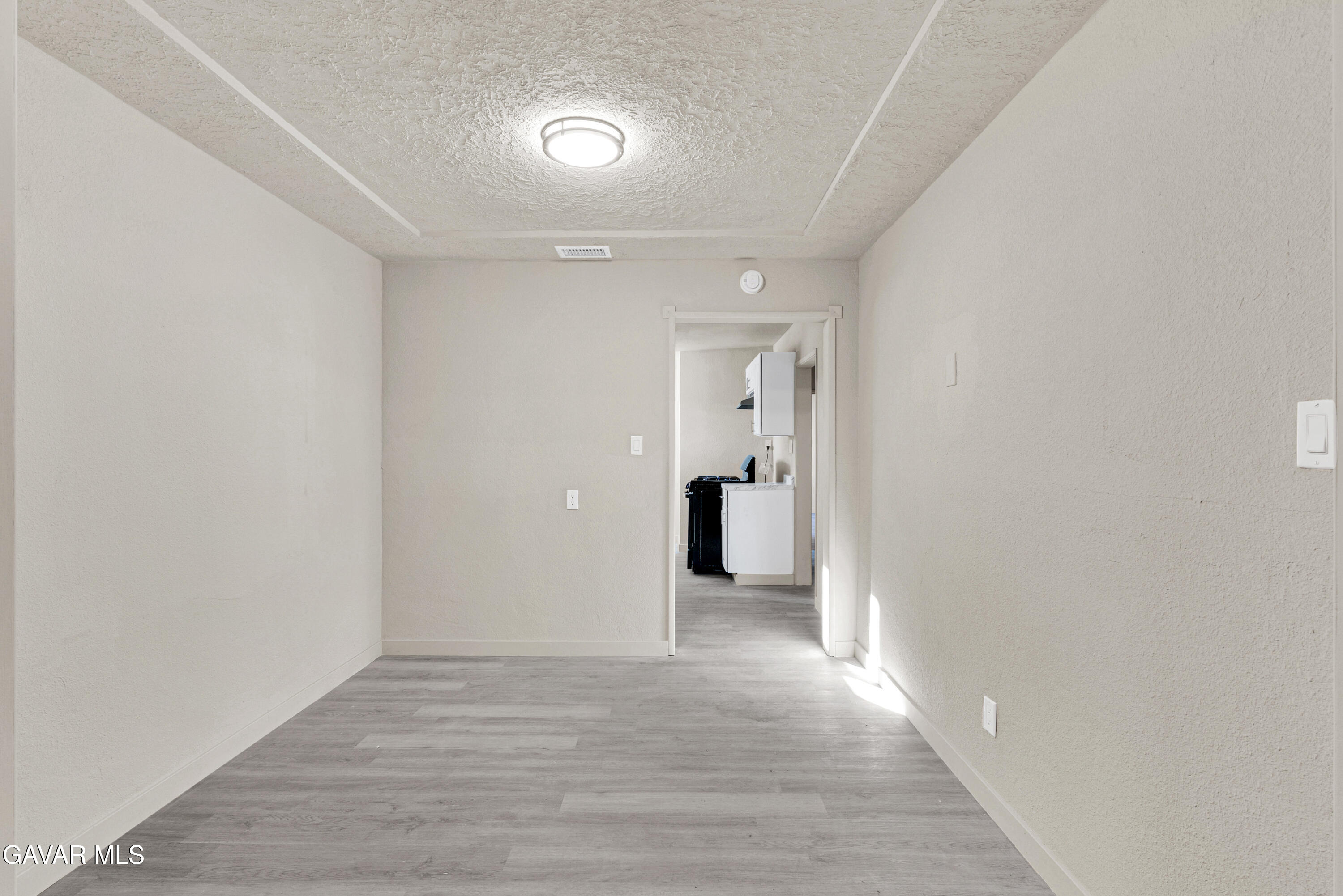 2494 Nadean Mojave, CA 93501 - Photo 8 of 19 a view of hallway with wooden floor