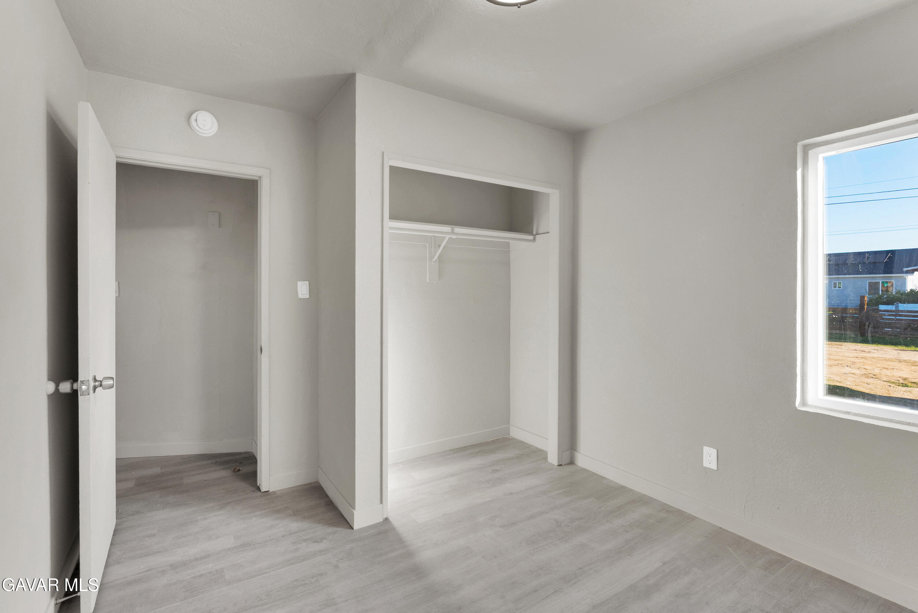 2494 Nadean Mojave, CA 93501 - Photo 9 of 19 an empty room with windows and closet