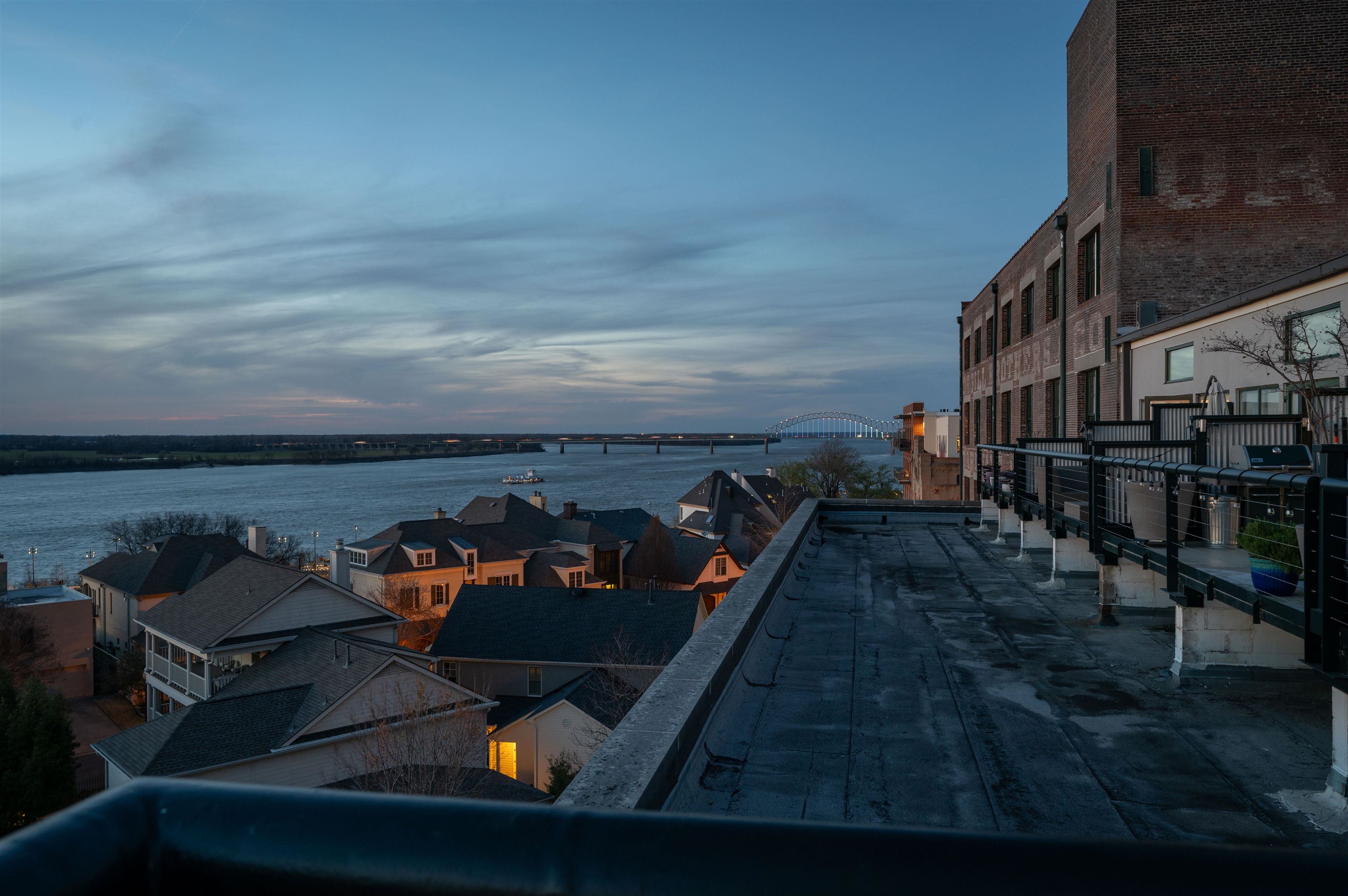 505 Tennessee Street, Unit 407 Memphis, TN 38103 - Photo 14 of 27 an outdoor sitting area with furniture and water view