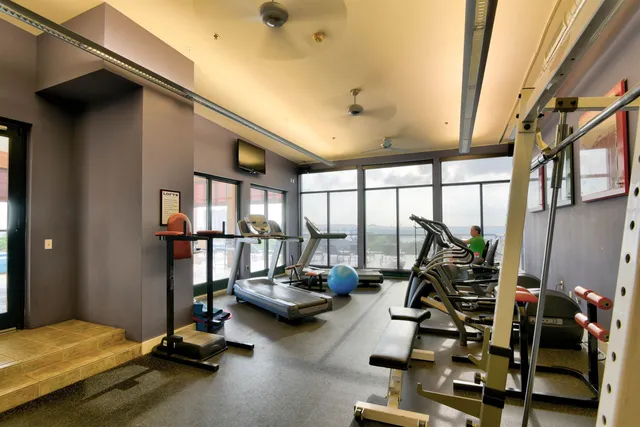 a view of a room with gym equipment