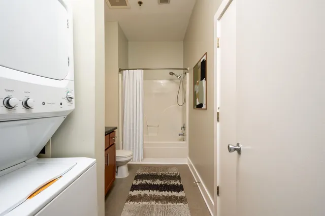 a bathroom with a sink and a shower