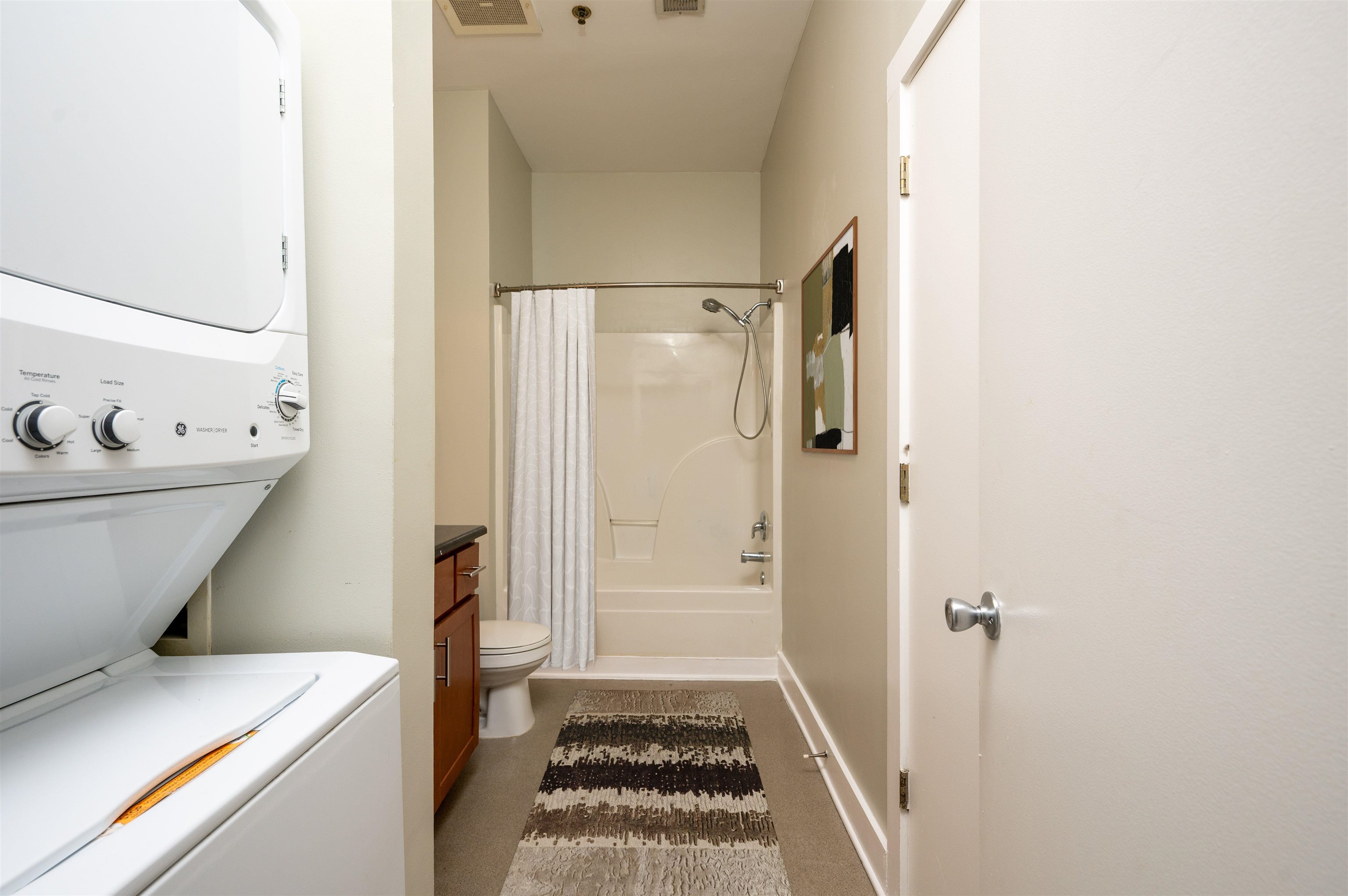 505 Tennessee Street, Unit 407 Memphis, TN 38103 - Photo 3 of 27 a bathroom with a sink and a shower