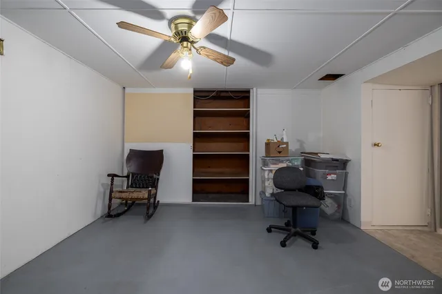 a view of a workspace with furniture