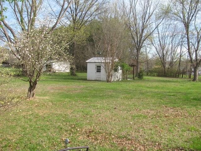 5515 Cove Road Roanoke, VA 24019 - Photo 3 of 25 a white house that has a tree in front of it