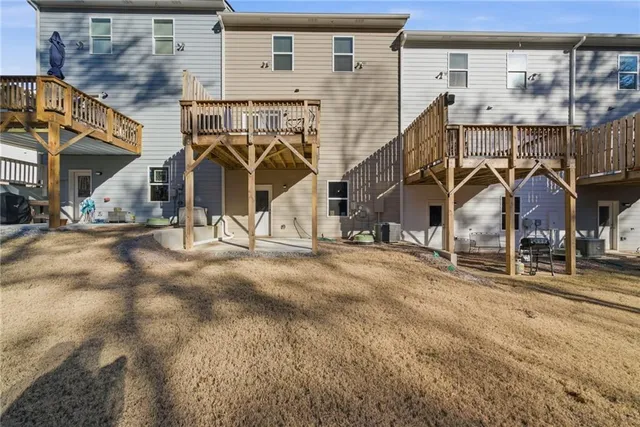 an aerial view of a house with outdoor space