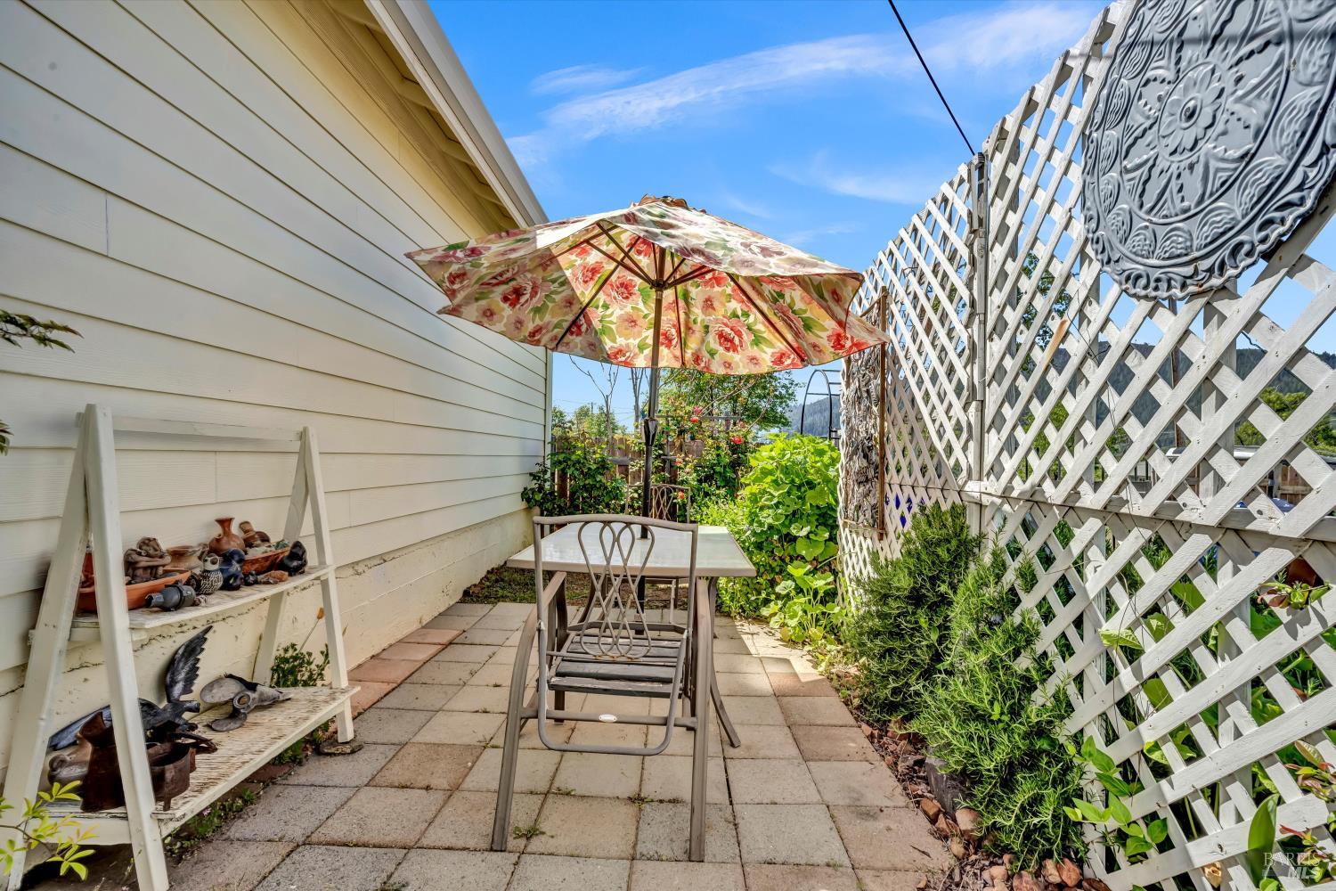 15314 Summit Boulevard Cobb, CA 95426 - Photo 18 of 29 a view of a chairs and table in backyard