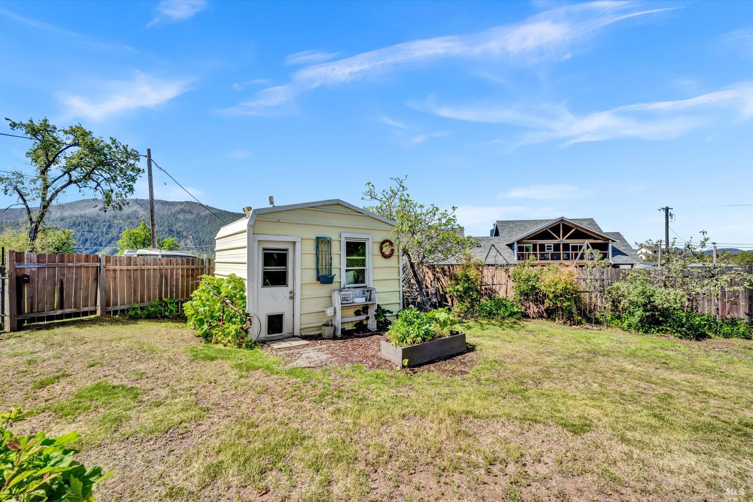 15314 Summit Boulevard Cobb, CA 95426 - Photo 20 of 29 a front view of house with yard outdoor seating and entertaining space