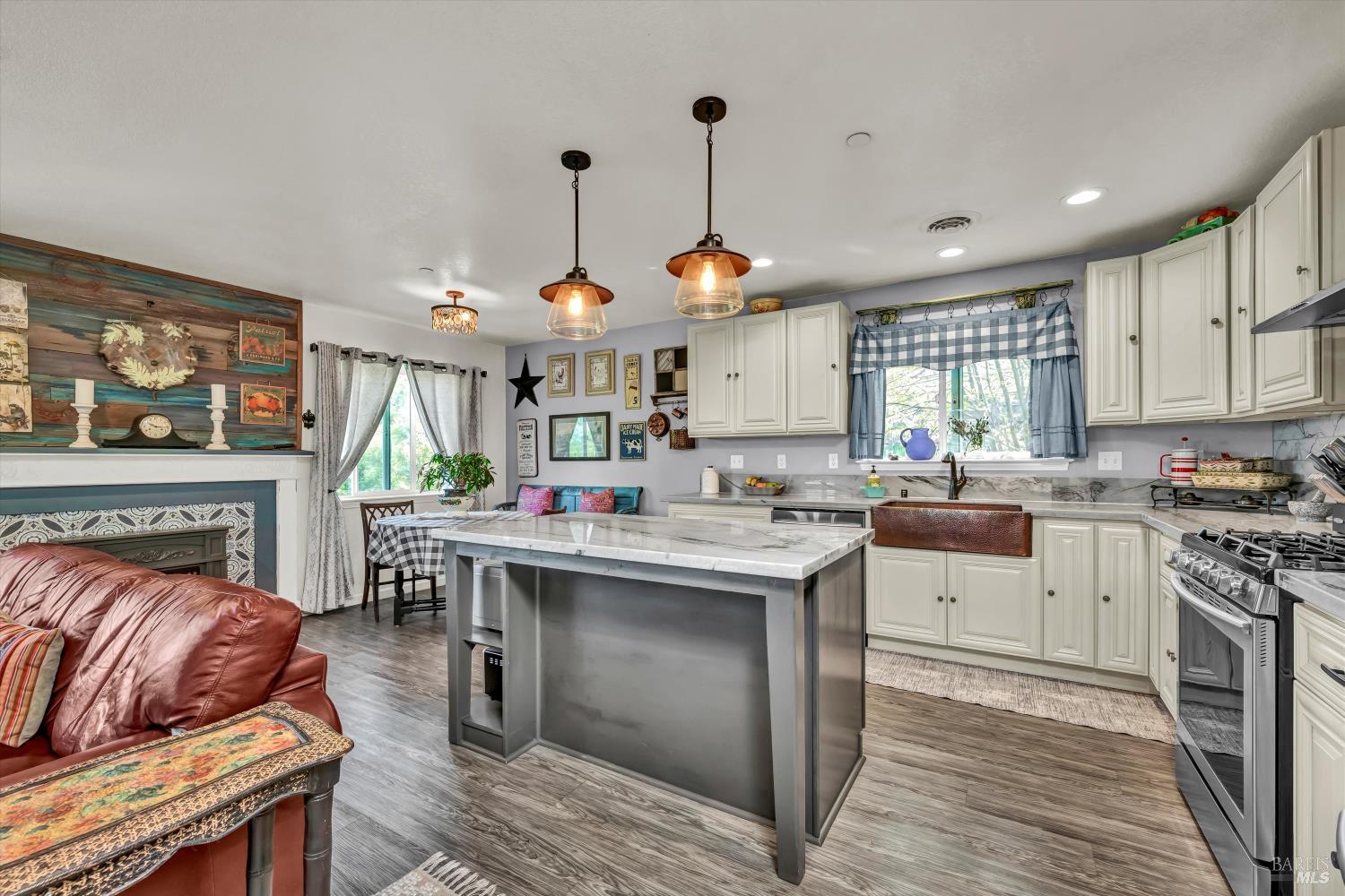 15314 Summit Boulevard Cobb, CA 95426 - Photo 2 of 29 a kitchen with stainless steel appliances granite countertop a sink stove and refrigerator