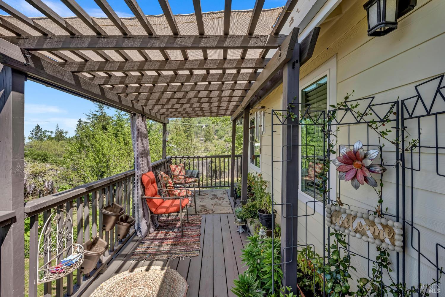 15314 Summit Boulevard Cobb, CA 95426 - Photo 28 of 29 a balcony view with a sitting space
