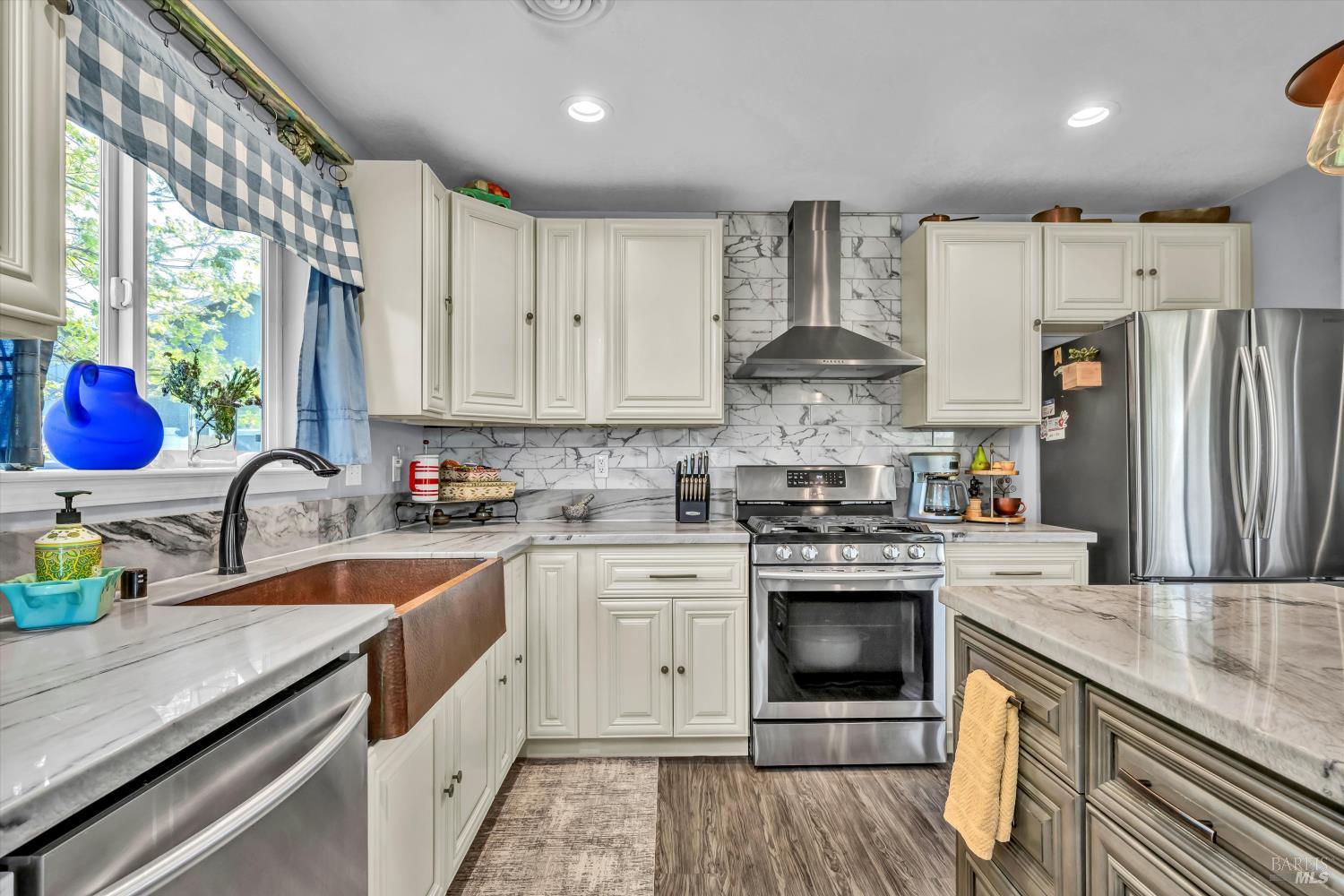 15314 Summit Boulevard Cobb, CA 95426 - Photo 4 of 29 a kitchen with a stove sink and refrigerator