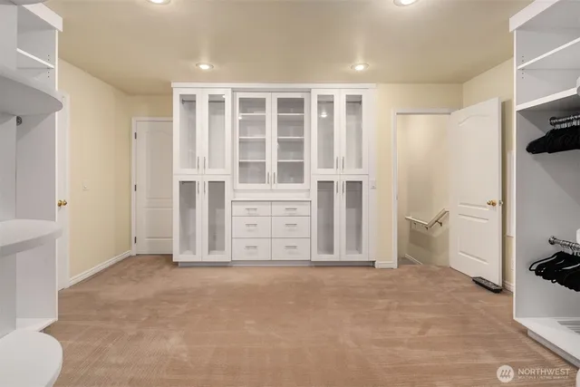 a view of an empty walk in closet