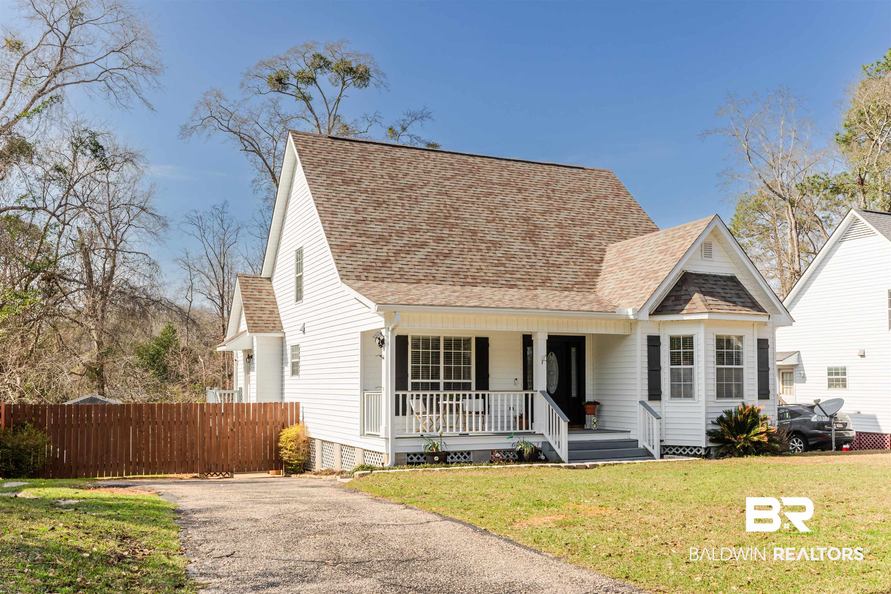 3844 Isabel Way South Mobile, AL 36693 - Photo 3 of 49 View of front of property featuring a porch and a front yard