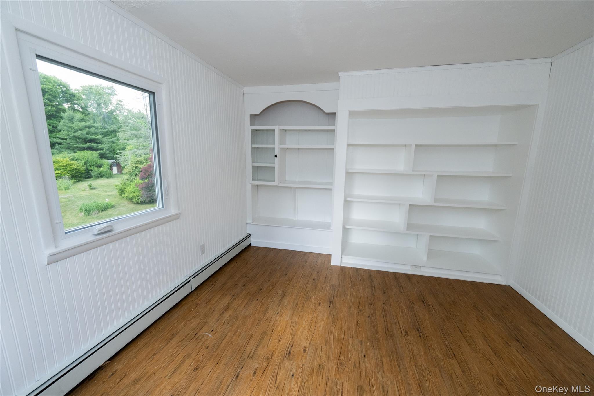 136 Foggintown Road Brewster, NY 10509 - Photo 32 of 50 a view of a room with wooden floor and window
