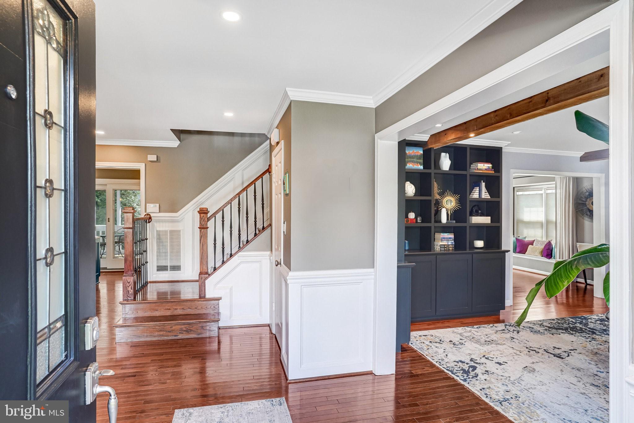 9009 Digory Court Burke, VA 22015 - Photo 18 of 51 a view of entryway livingroom and hall with wooden floor