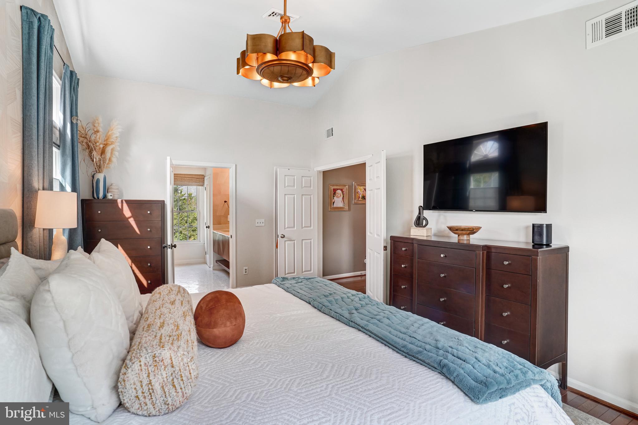 9009 Digory Court Burke, VA 22015 - Photo 2 of 51 a bedroom with a bed and a flat screen tv