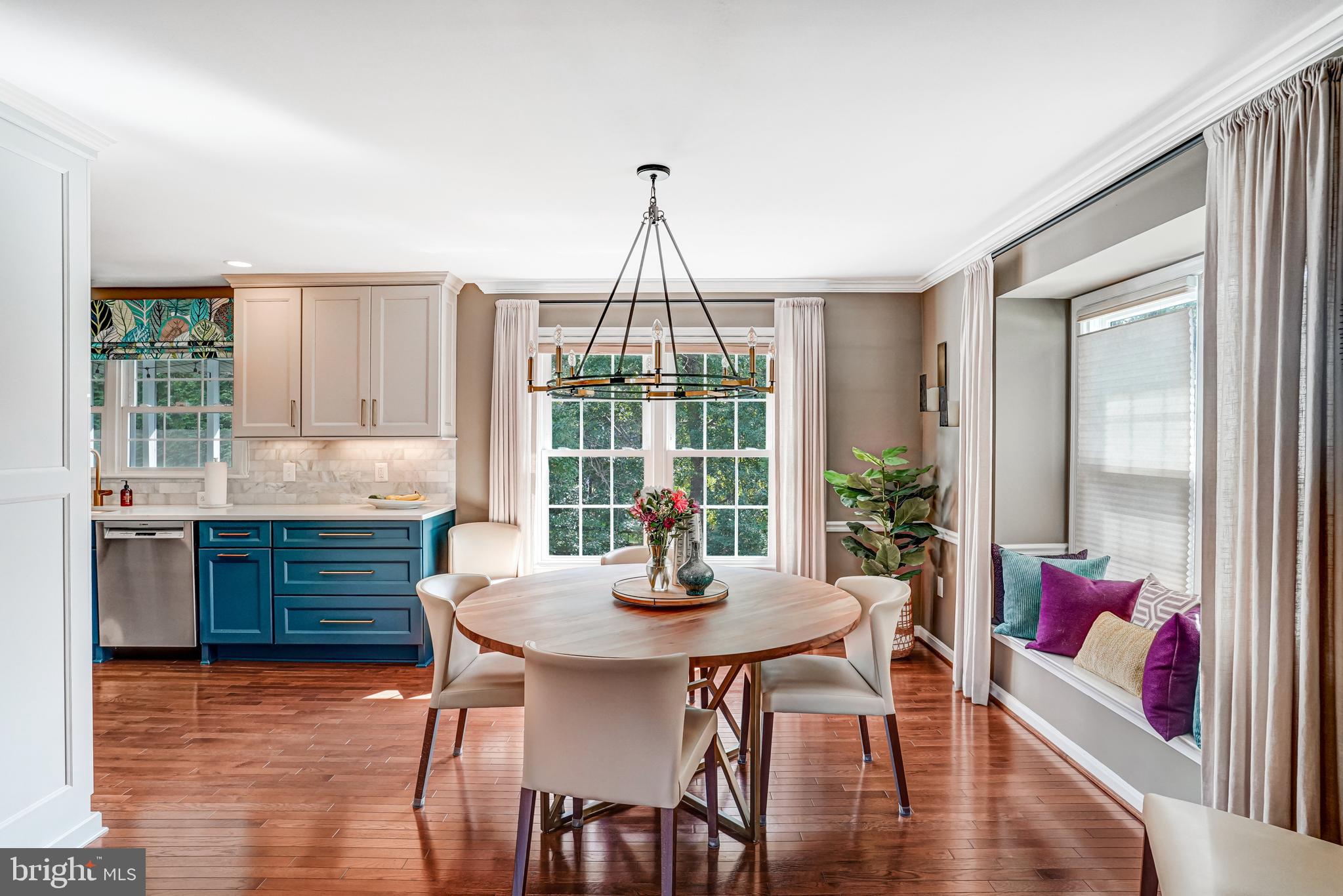 9009 Digory Court Burke, VA 22015 - Photo 22 of 51 a dining room with furniture window and wooden floor