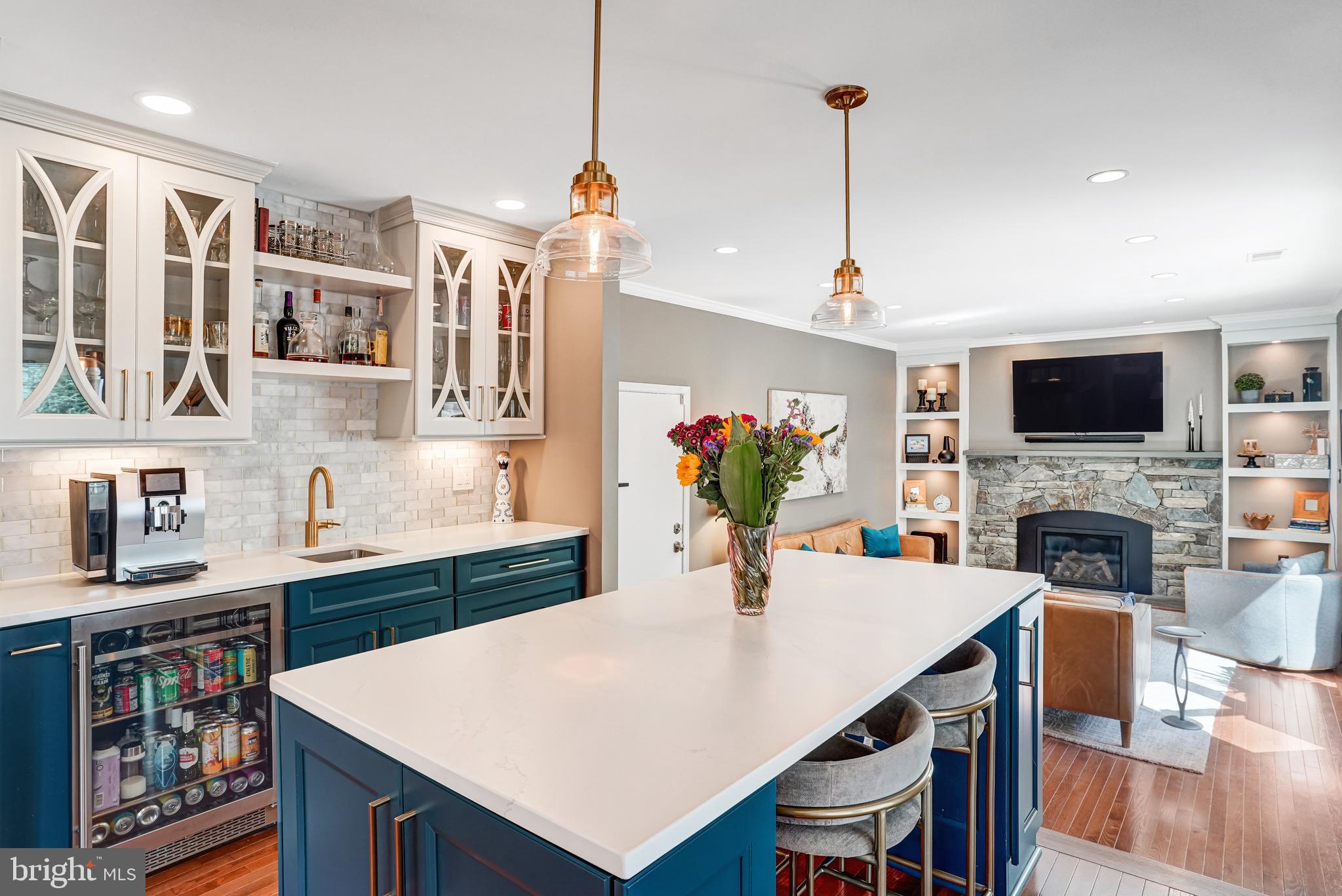 9009 Digory Court Burke, VA 22015 - Photo 28 of 51 a view of kitchen island with furniture and wooden floor