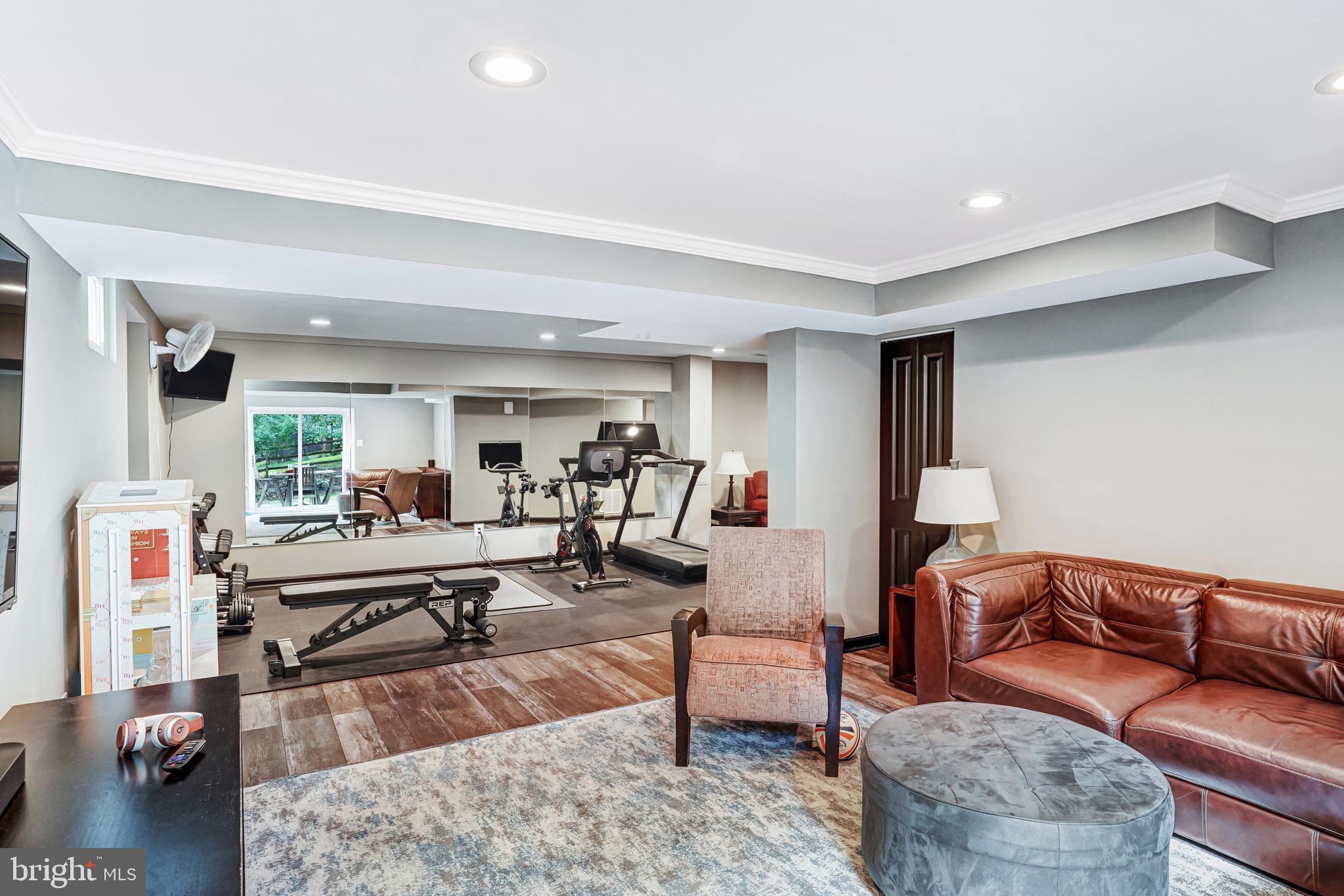 9009 Digory Court Burke, VA 22015 - Photo 38 of 51 a living room with furniture and a couch