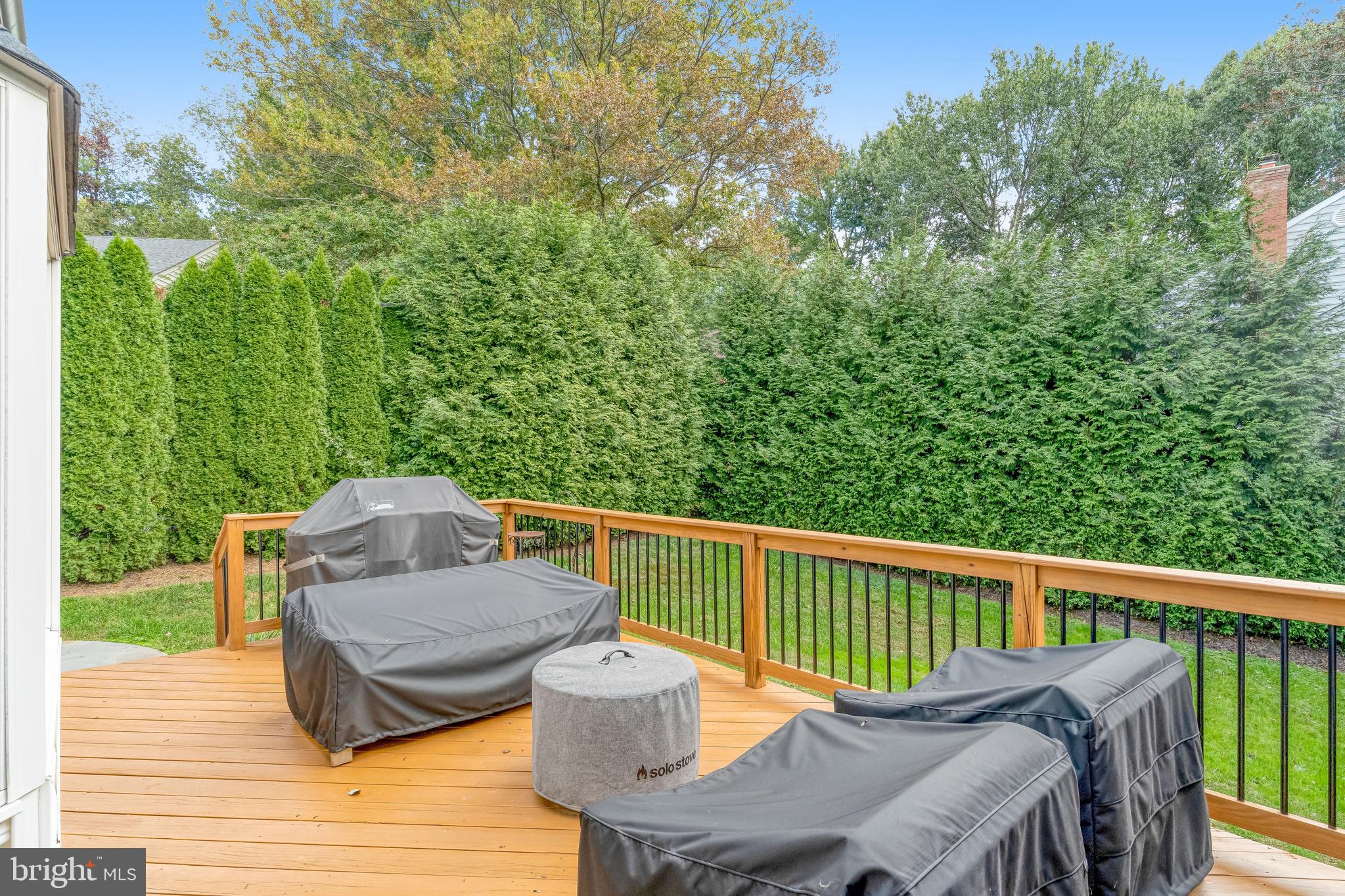 9009 Digory Court Burke, VA 22015 - Photo 42 of 51 a balcony with wooden floor table and chairs