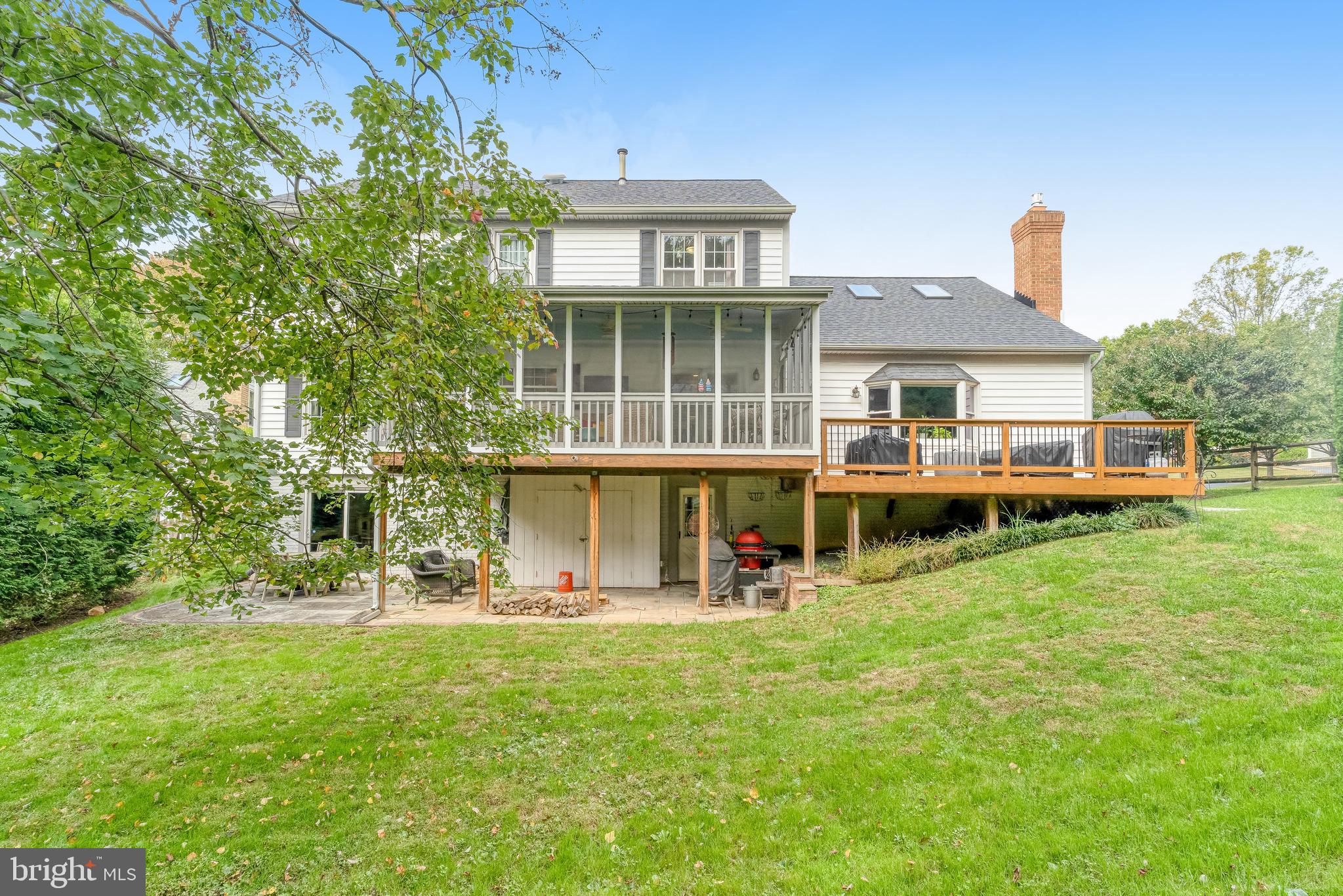 9009 Digory Court Burke, VA 22015 - Photo 45 of 51 front view of a house with a yard