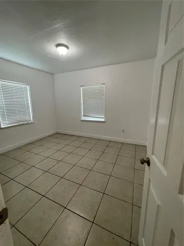a view of a room & utility room