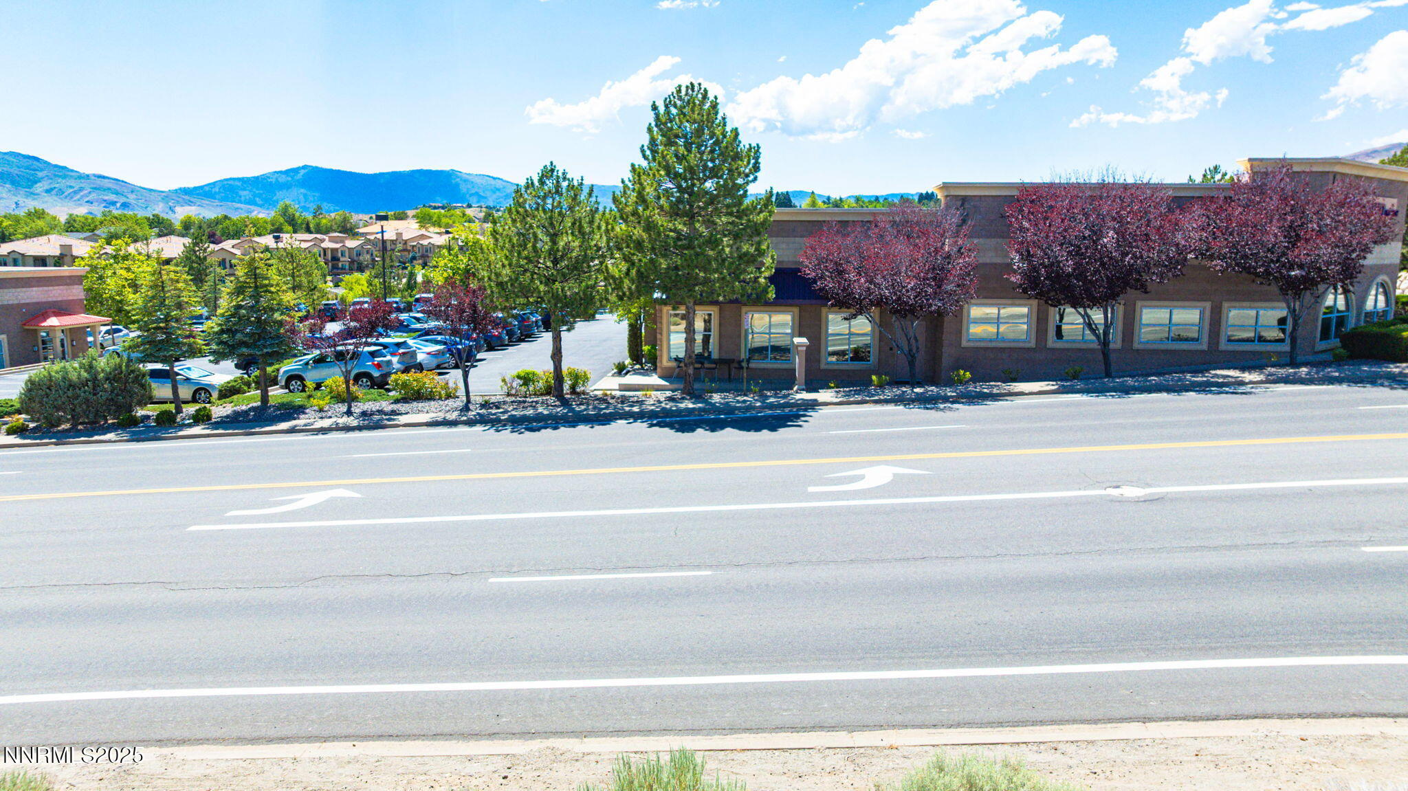 0 Simons Drive Reno, NV 89523 - Photo 11 of 36 a front view of a house with a garden and mountain view
