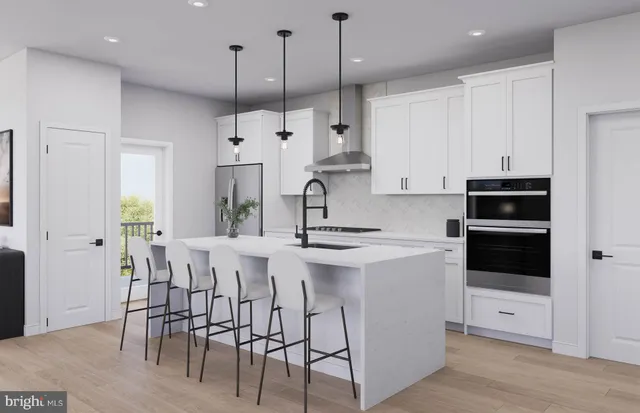 a view of a dining room with furniture and window