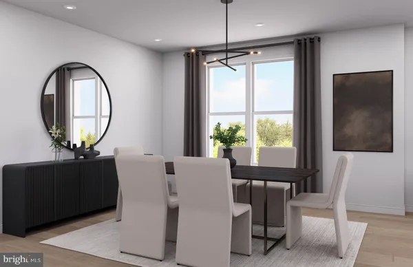 a kitchen with stainless steel appliances kitchen island granite countertop a table and chairs in it