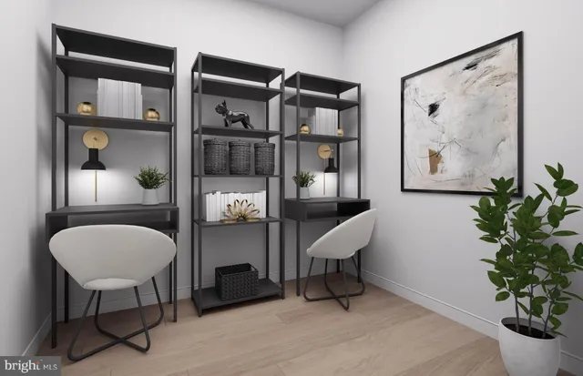 a view of a livingroom with furniture and a window