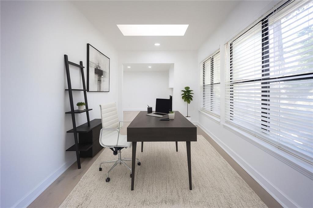 2712 Huntingdon Chase Atlanta, GA 30350 - Photo 12 of 27 a view of a workspace with furniture