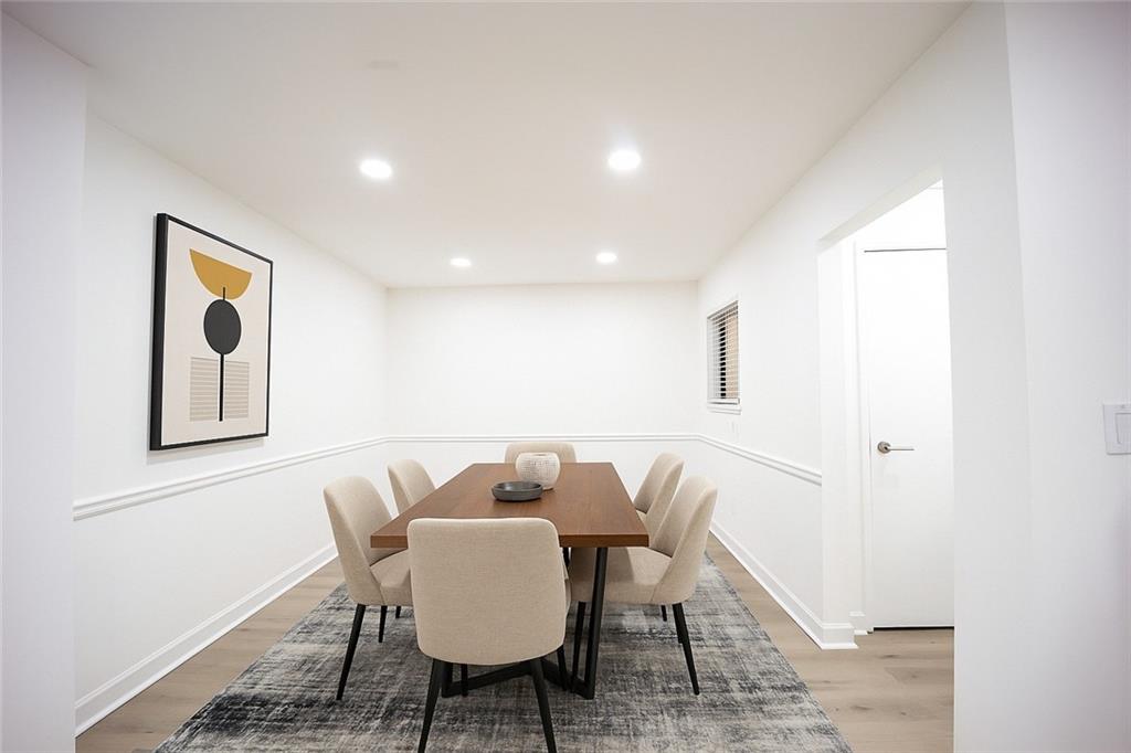 2712 Huntingdon Chase Atlanta, GA 30350 - Photo 2 of 27 a view of a dining room with furniture
