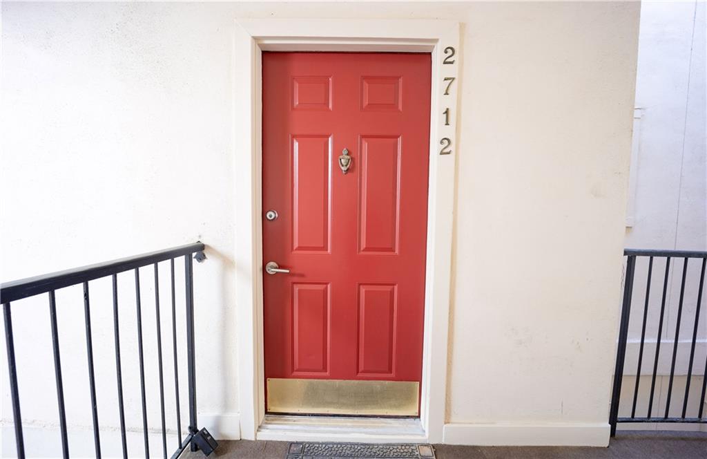 2712 Huntingdon Chase Atlanta, GA 30350 - Photo 22 of 27 a view of a red door in the house