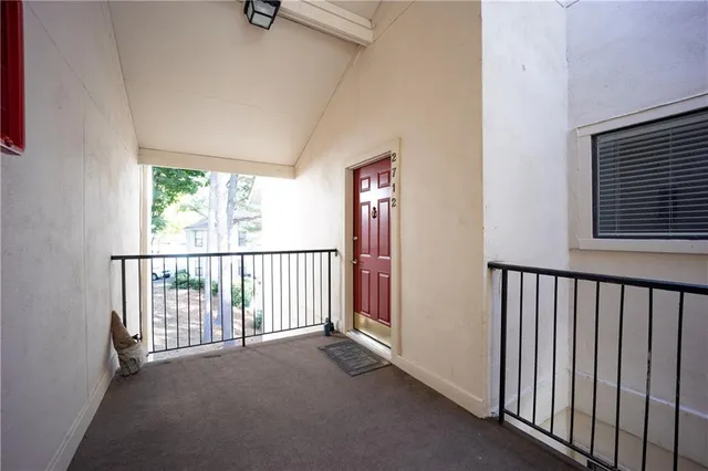 a view of a balcony with window