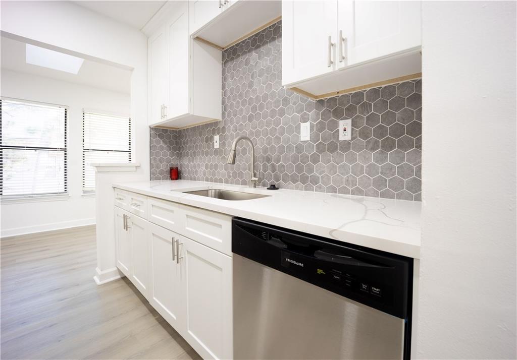 2712 Huntingdon Chase Atlanta, GA 30350 - Photo 3 of 27 a close view of a sink and a mirror in a room