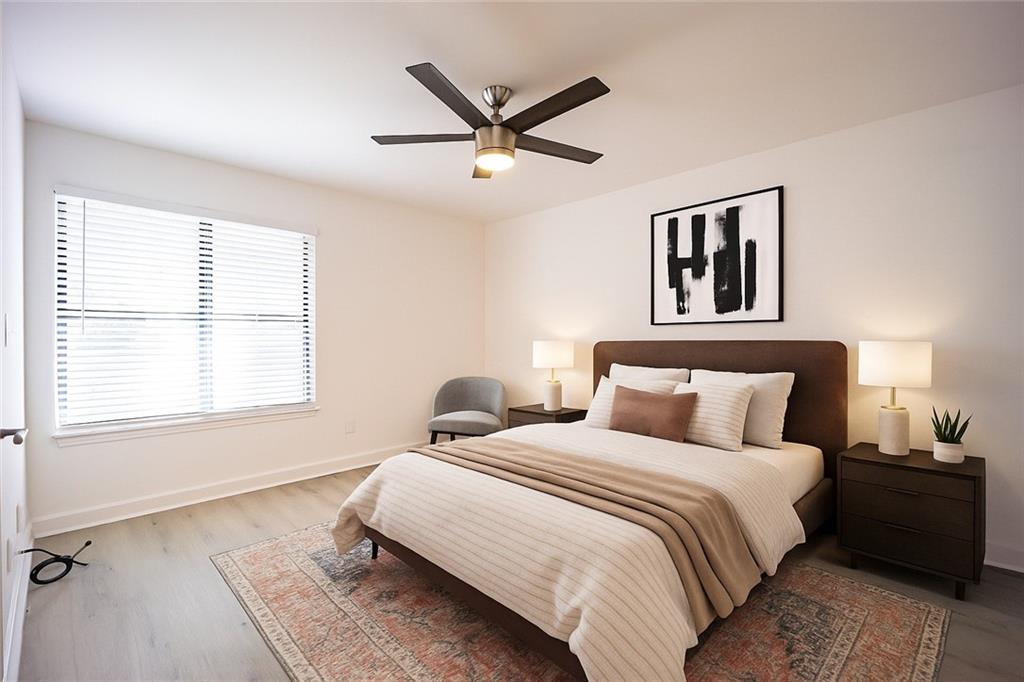 2712 Huntingdon Chase Atlanta, GA 30350 - Photo 6 of 27 a bedroom with a bed and window