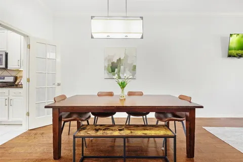 a view of a dining room with furniture
