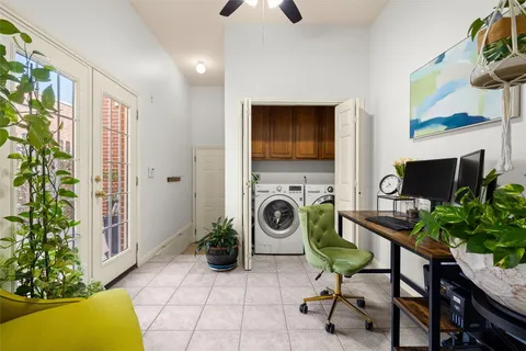 a view of a livingroom with furniture and a flat screen tv