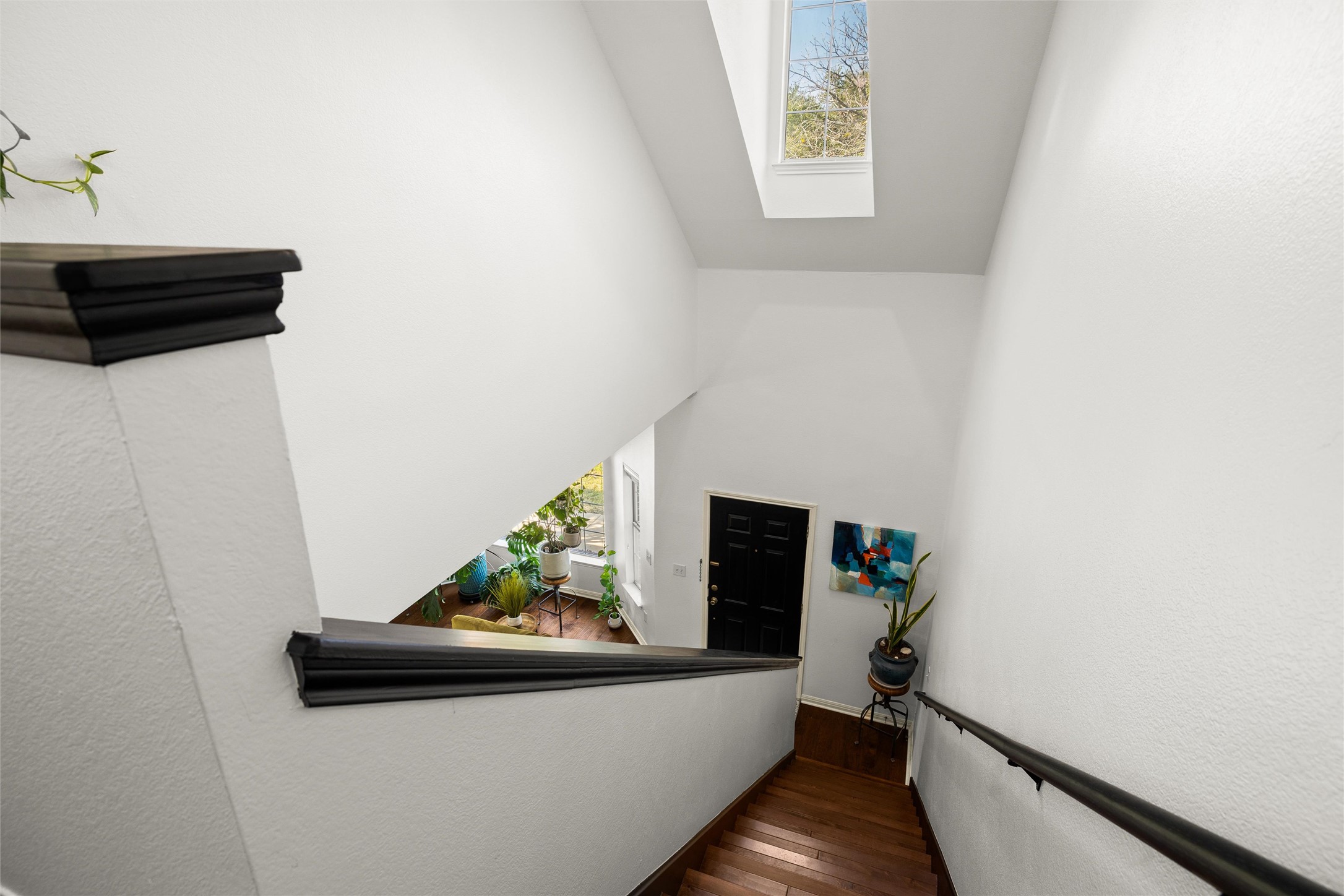5515 Davis Lane, Unit 32 Austin, TX 78749 - Photo 20 of 40 a view of hallway with wooden floor and cabinet