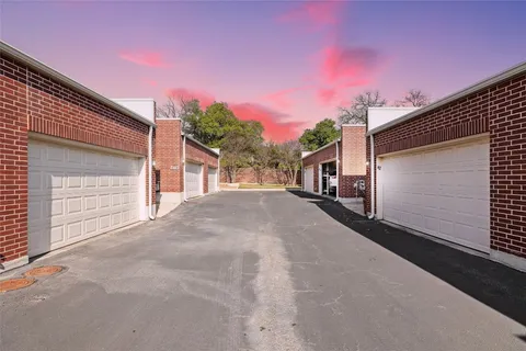 a view of a house with a street
