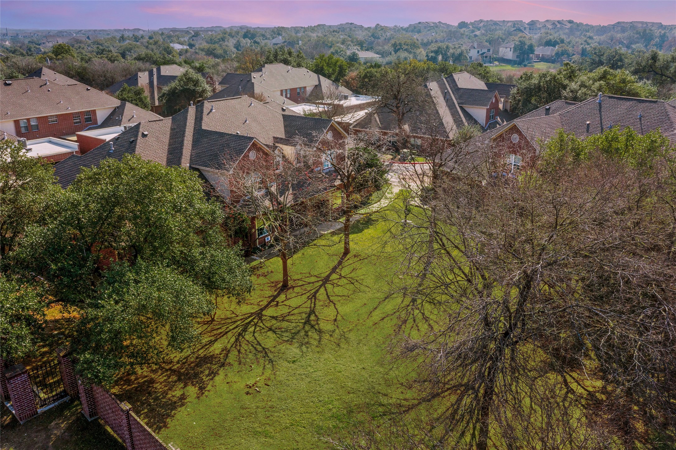 5515 Davis Lane, Unit 32 Austin, TX 78749 - Photo 36 of 40 a view of a lake with a mountain in the background