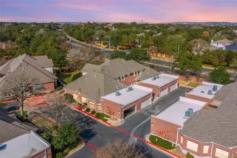 an aerial view of a city with lots of residential buildings