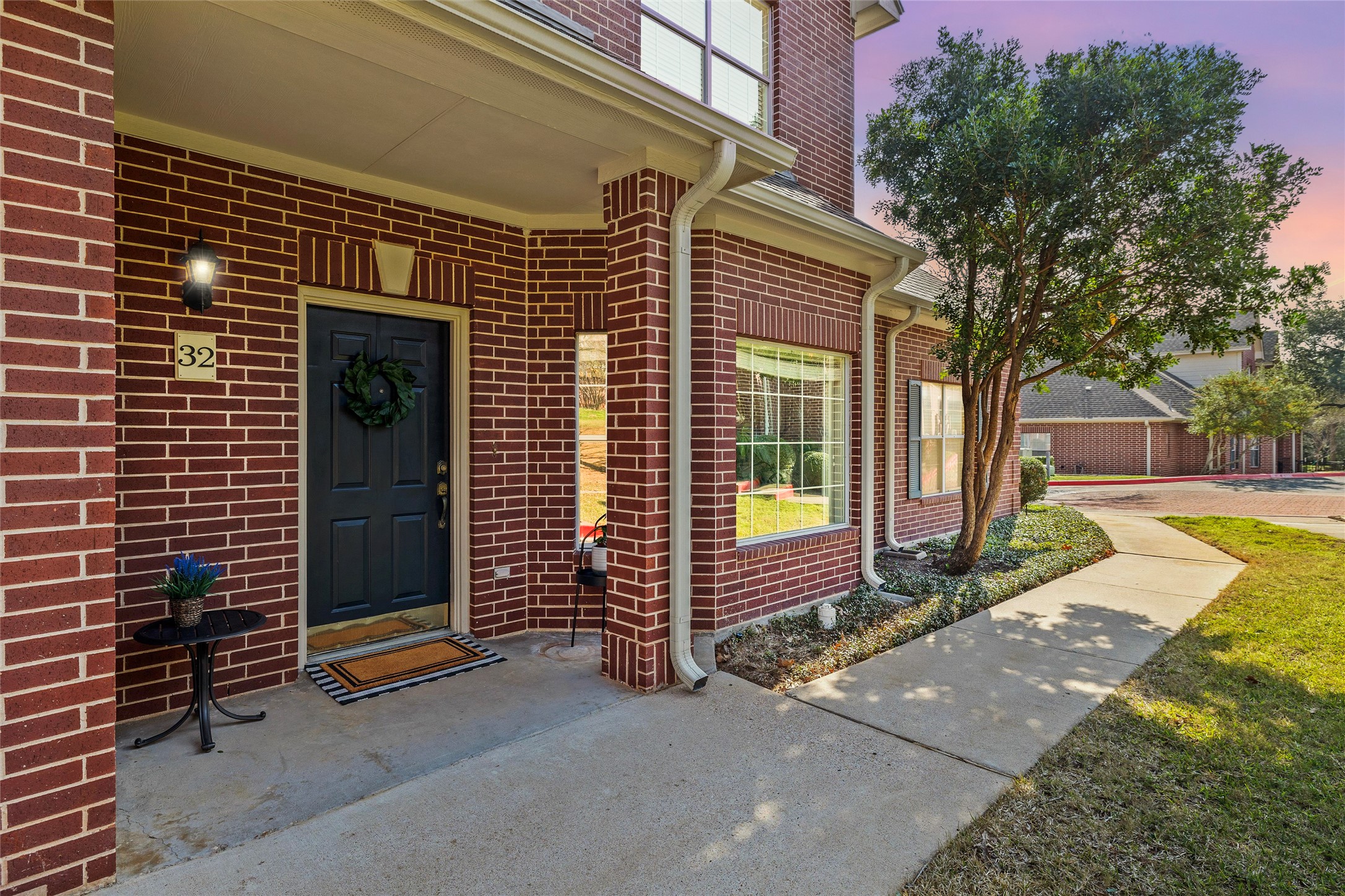 5515 Davis Lane, Unit 32 Austin, TX 78749 - Photo 5 of 40 a front view of a house with a garage