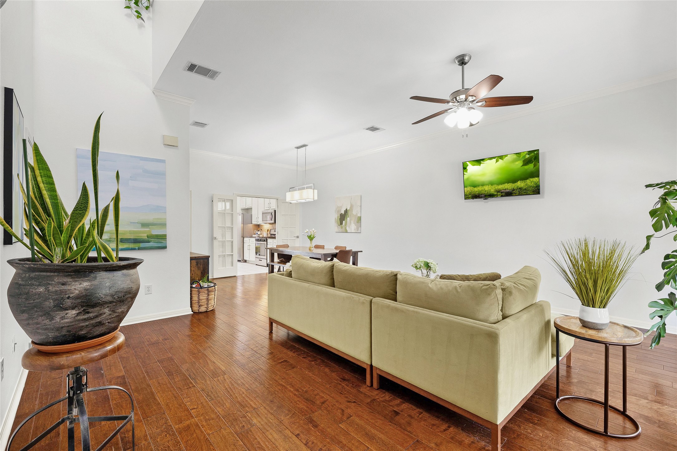5515 Davis Lane, Unit 32 Austin, TX 78749 - Photo 8 of 40 a living room with furniture a potted plant and a rug