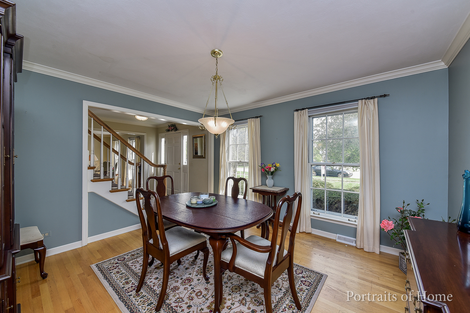 29 Christina Circle Wheaton, IL 60189 - Photo 3 of 28 a view of a dining room with furniture window and wooden floor