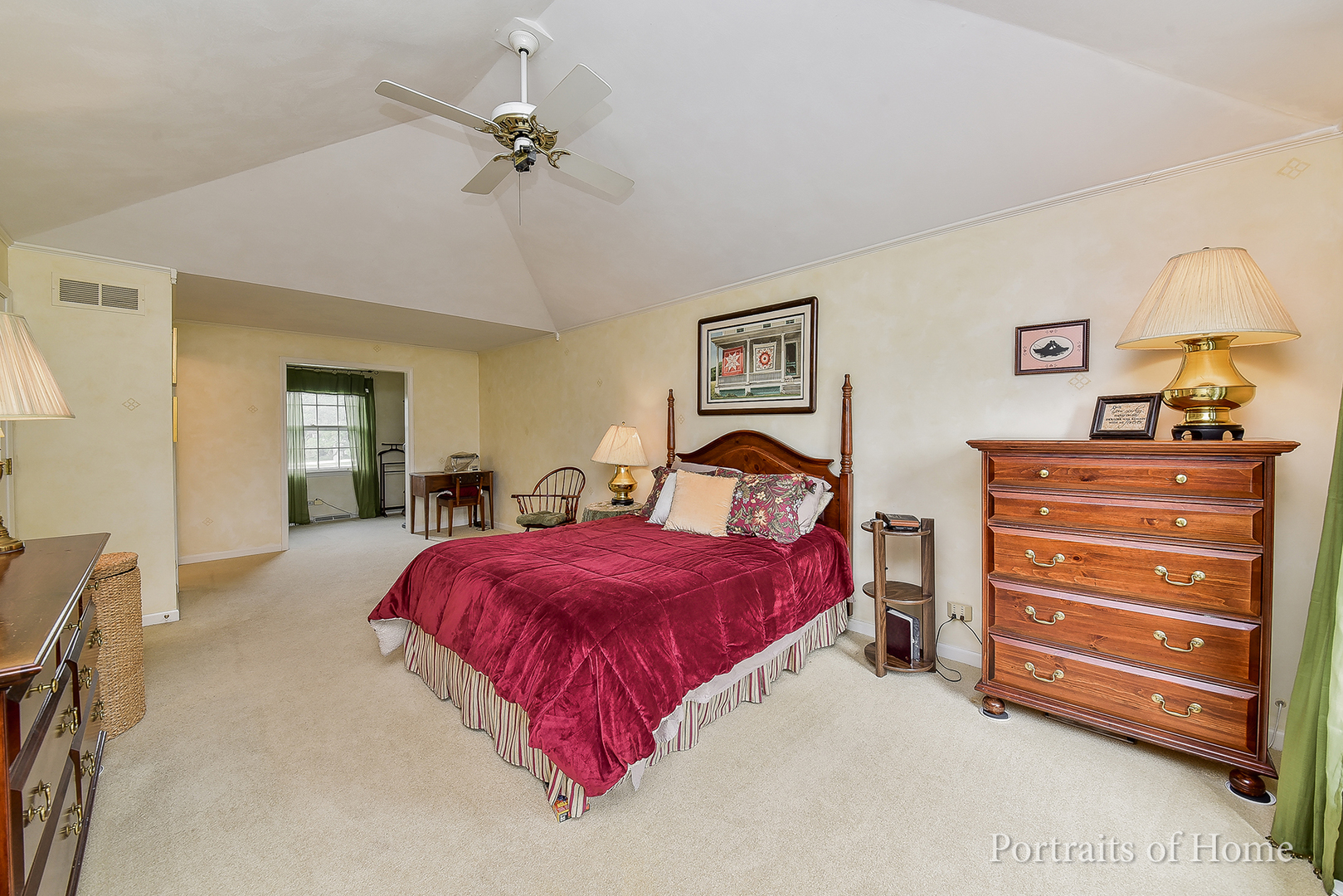 29 Christina Circle Wheaton, IL 60189 - Photo 10 of 28 a bedroom with a bed and a chandelier