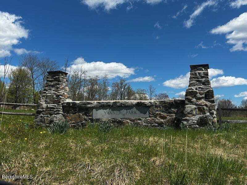 Lot 3 Town Hill Road Sandisfield, MA 01255 - Photo 14 of 16 a view of a water pond with green field