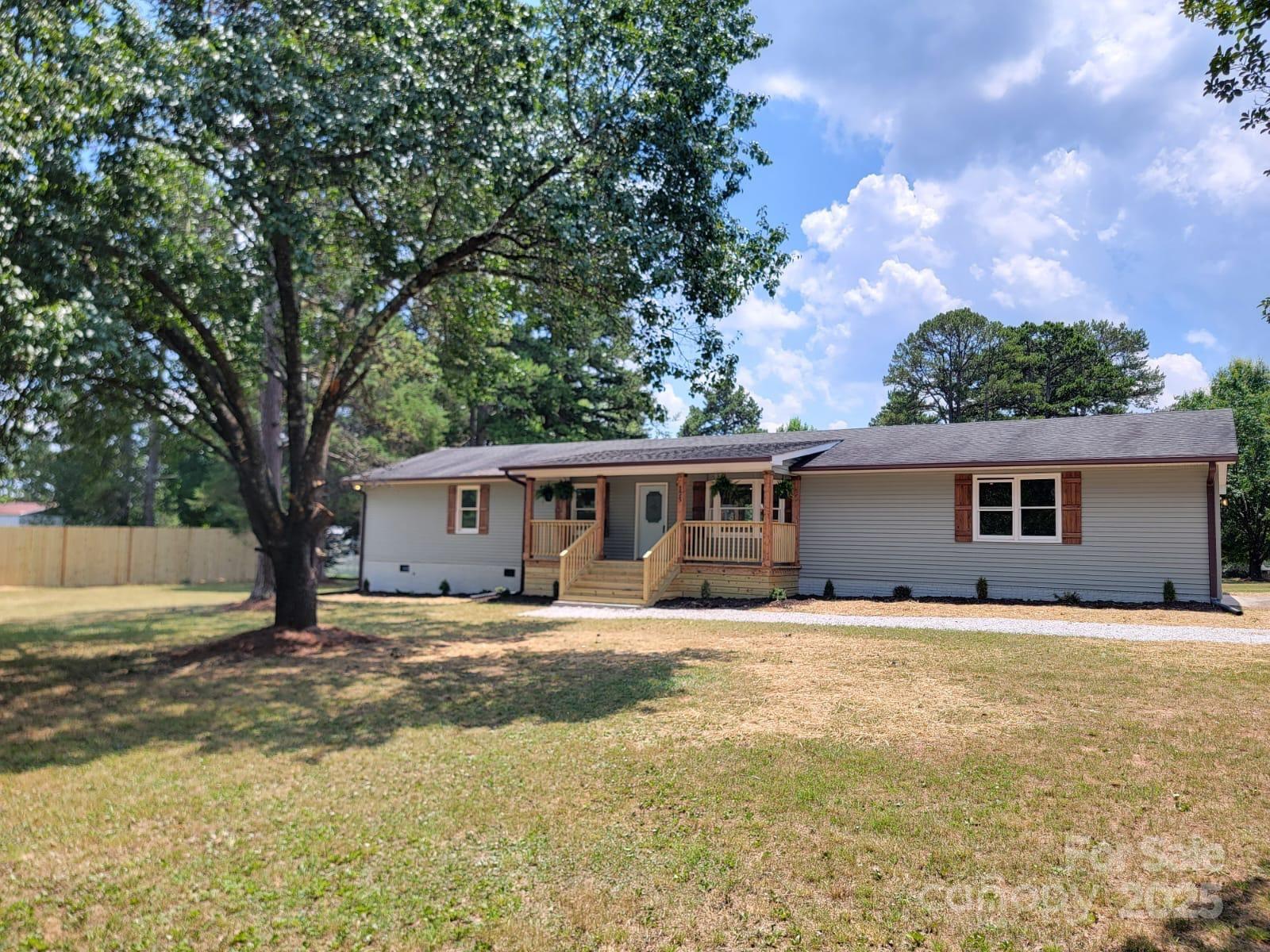 175 Pebble Drive Salisbury, NC 28147 - Photo 2 of 42 a house that has a tree in front of it